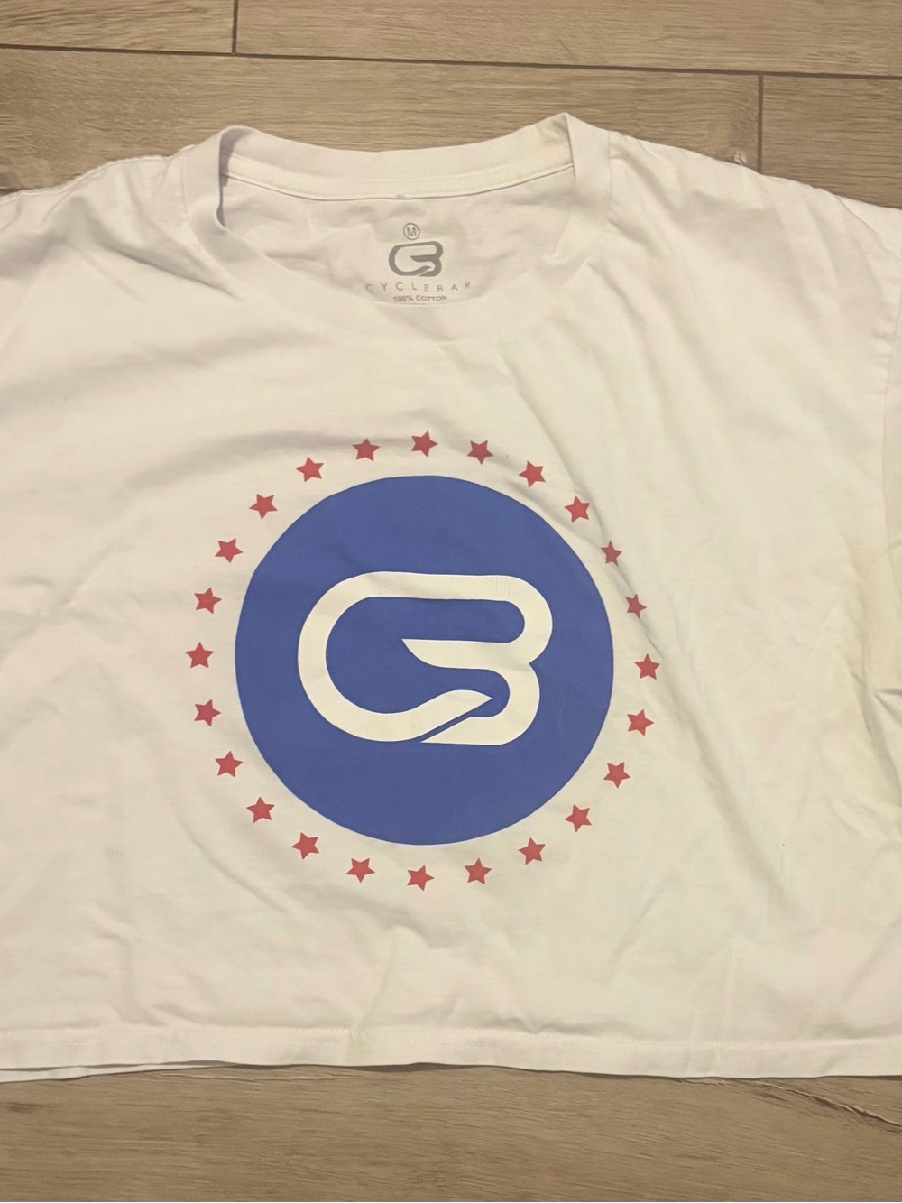 Cyclebar White Short Sleeve Tee with Blue Logo and Red Stars